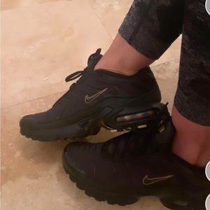 Black and gold Nike air max